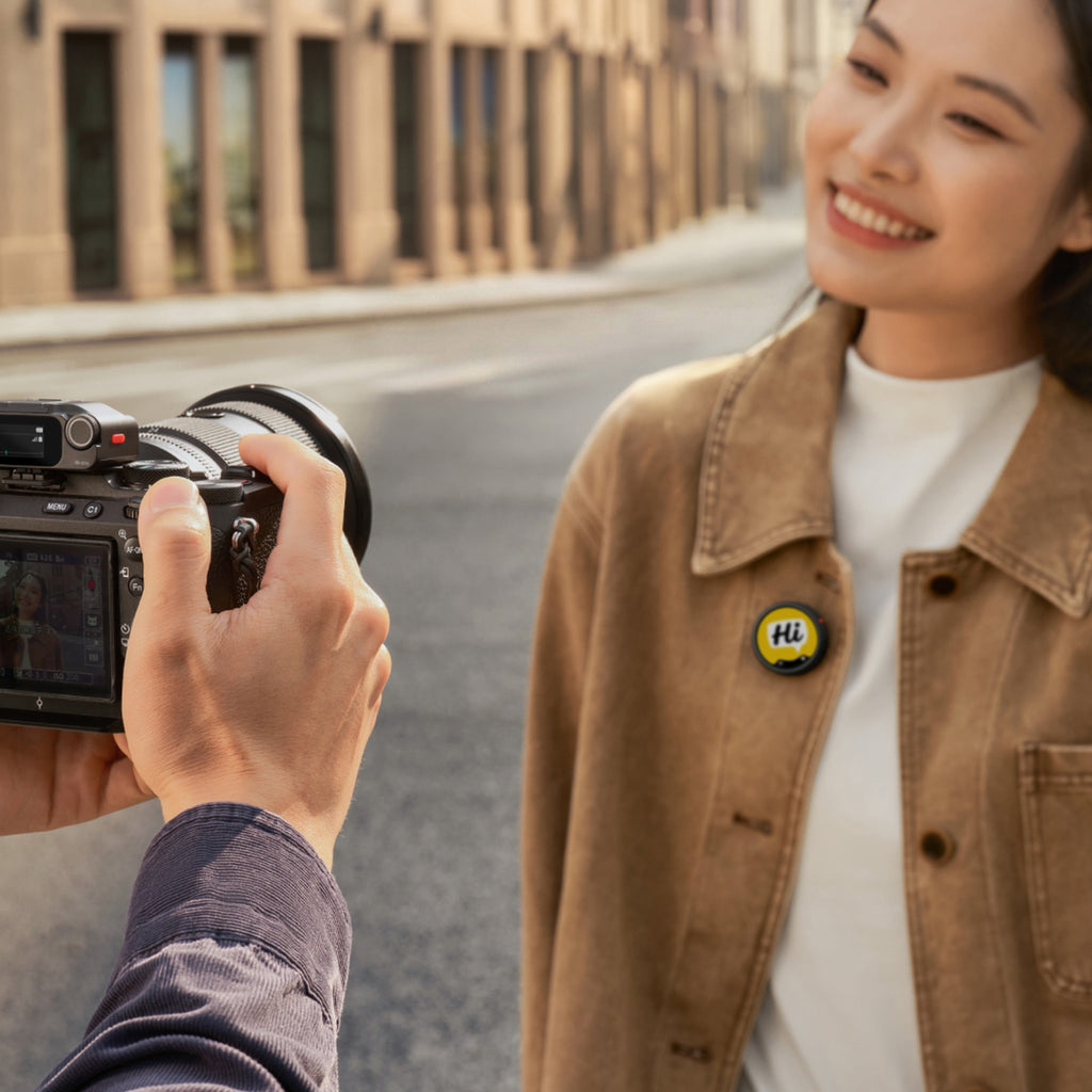 Insta360 Mic Pro Transmitter worn on a jacket during a street shoot