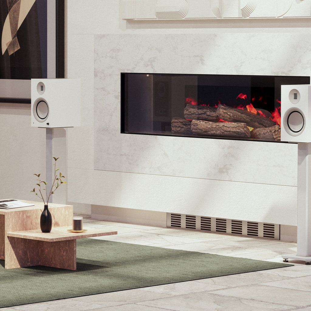 Kanto Audio TUK Grand in Matte White on stands either side of a fireplace