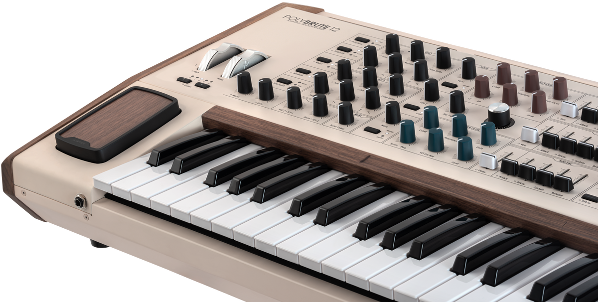 Arturia PolyBrute 12 synthesizer with keyboard and control panel, showcasing its detailed interface and 12-voice polyphony.