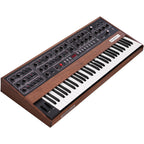 Sequential Prophet-5 synthesizer with vintage design, featuring multiple knobs and sliders on a classic analog keyboard.