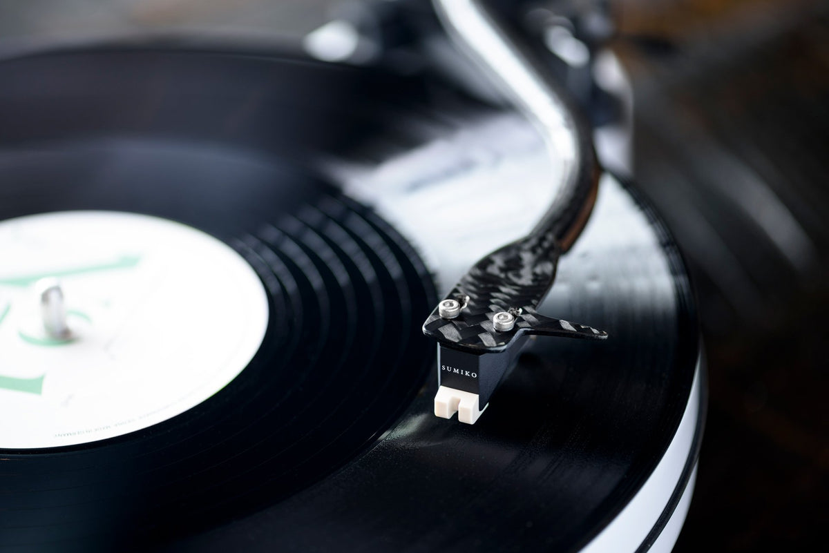 Sumiko Rainier MM phono stylus for turntables, shown in a close-up with detailed needle and cartridge components.